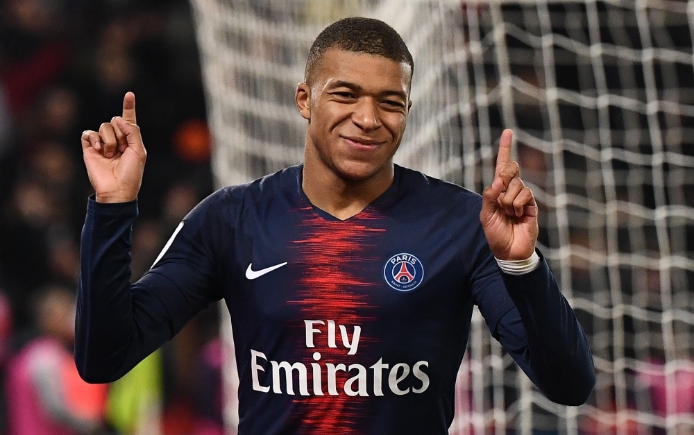 Paris Saint-Germain's French forward Kylian MBappe celebrates his first goal during the French Ligue 1 football match between Paris Saint-Germain (PSG) and Montpellier (MHSC) at the Parc des Princes stadium in Paris on Wednesday. — AFP