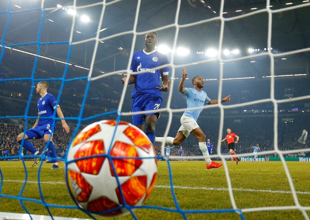 Manchester City's English forward Raheem Sterling celebrates after scoring during the UEFA Champions League round of 16 first leg football match against Schalke 04 on Wednesday in Gelsenkirchen, Germany. — AFP