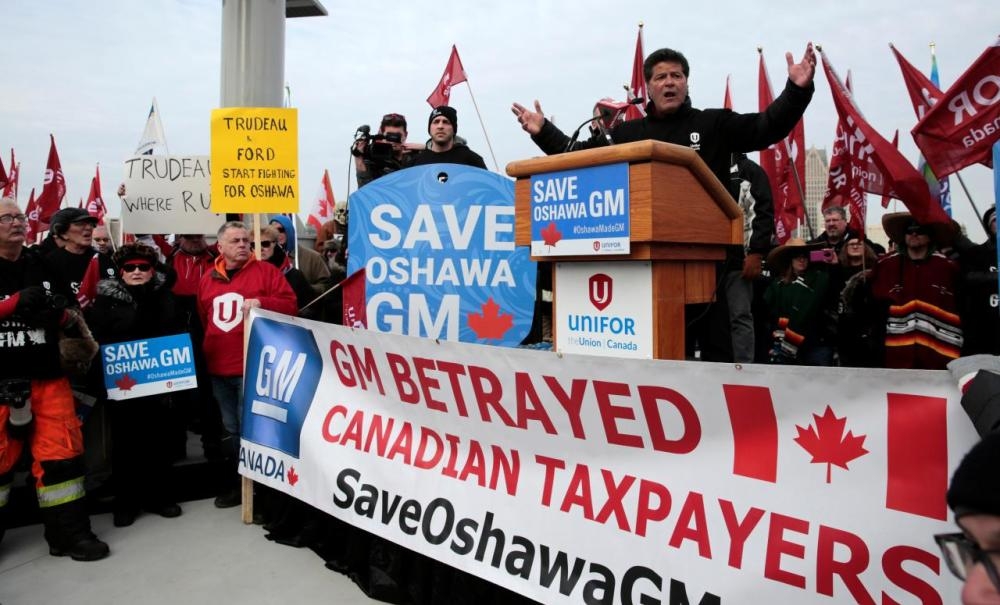 Unifor national president Jerry Dias addresses General Motors assembly workers and supporters protesting GM's announcement to close its Oshawa assembly plant during a rally across the Detroit River from GM's headquarters, in Windsor, Ontario, Canada, in this recent photo. — Reuters