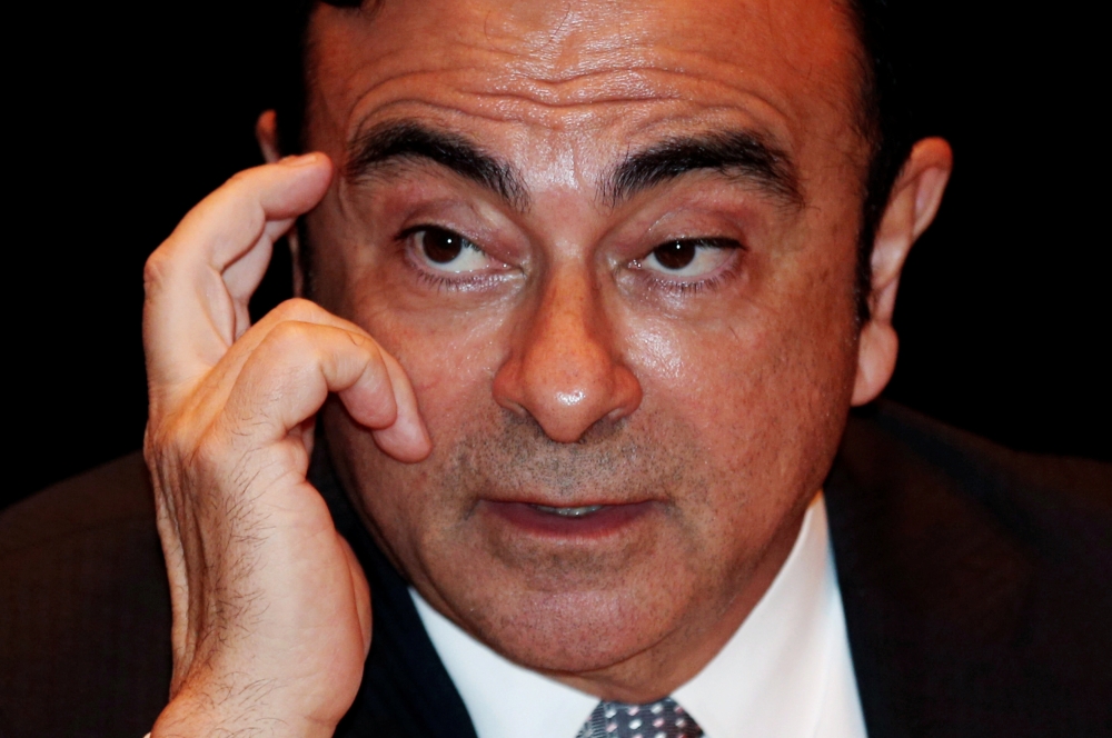 Carlos Ghosn, Chairman of the Mitsubishi and Nissan Alliance, gestures during a news conference at a hotel in Bangkok, Thailand, in this file photo. — Reuters