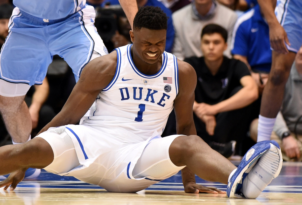 Duke Blue Devils forward Zion Williamson (1) reacts after falling during the first half against the North Carolina Tar Heels at Cameron Indoor Stadium, in this file photo.  — Reuters