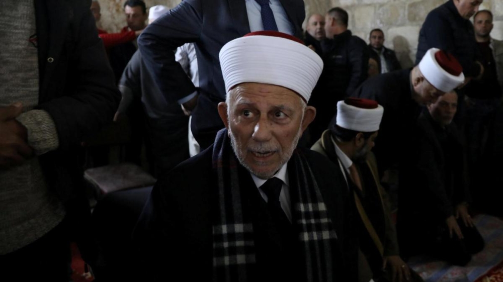 Chairman of the Waqf Council, Abdel-Azeem Salhab, attends Friday prayers together with other Palestinian Muslims inside the Golden Gate near Al-Aqsa Mosque in Jerusalem's Old City on Friday. — Reuters 