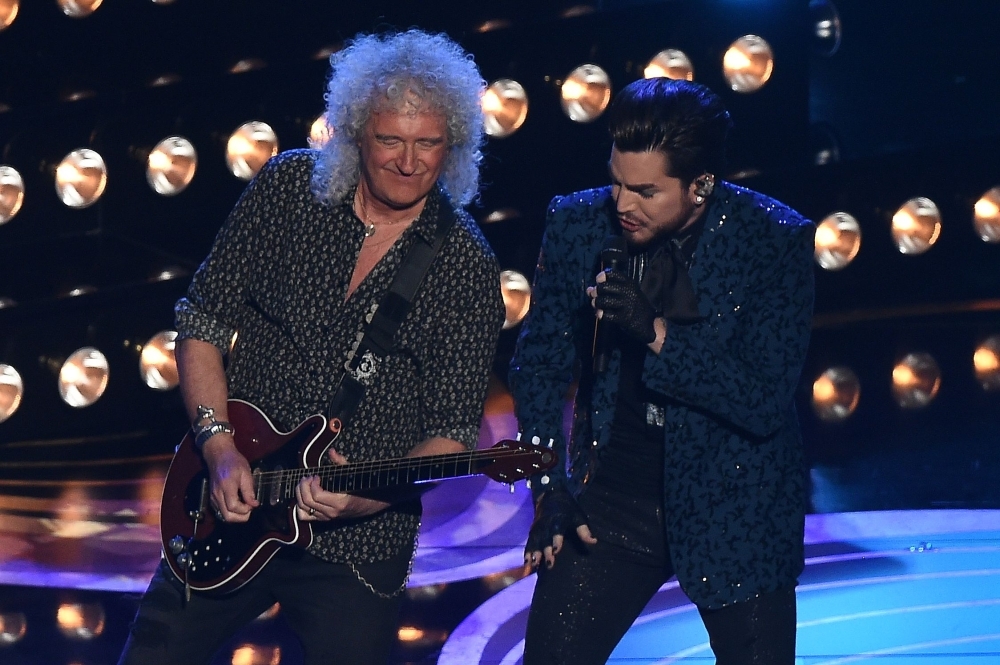 Member of British rock band Queen Brian May and US singer-songwriter Adam Lambert (L) perform during the 91st Annual Academy Awards at the Dolby Theater in Hollywood, California. — AFP