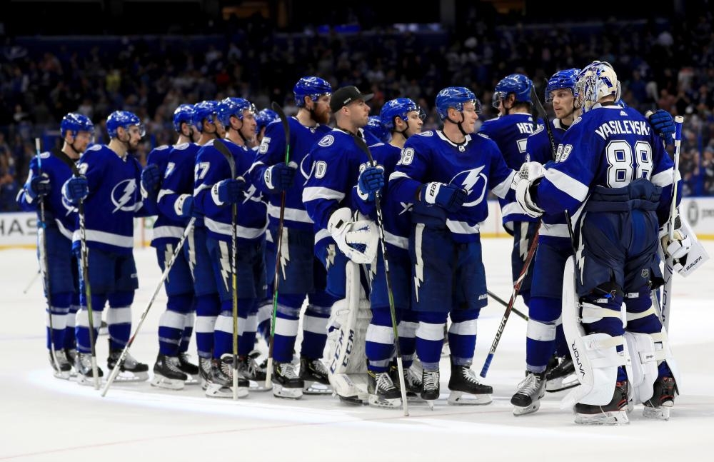 The Tampa Bay Lightning players celebrate a shootout win against the Los Angeles Kings during the NHL game at Amalie Arena in Tampa, Florida, Monday. — AFP