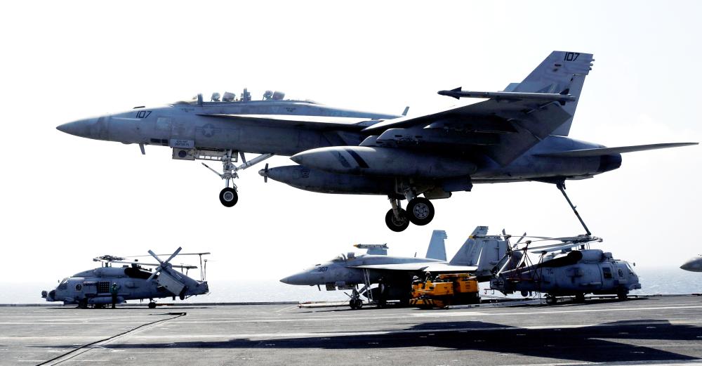 


A US Navy F18 fighter jet lands on the deck of aircraft carrier USS Carl Vinson  during a routine exercise in South China Sea, in this March 3, 2017 file photo. — Reuters