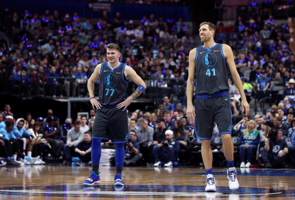 Luka Doncic (L) and Dirk Nowitzki