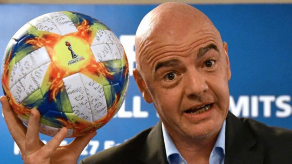 FIFA President Gianni Infantino, seen in this file photo, said that football’s governing body will consider changing the rules over the transfer of minors.