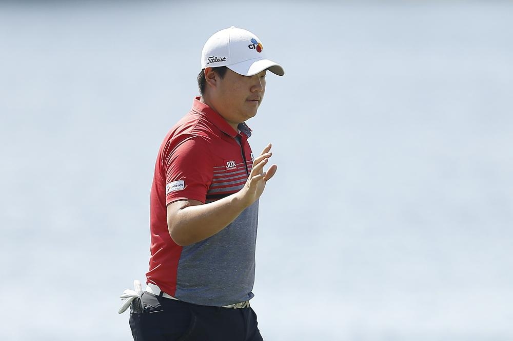 Im Sung-jae South Korea reacts after a birdie putt on the 18th hole during the second round of the Honda Classic at PGA National Resort and Spa in Palm Beach Gardens, Florida, Friday. — AFP