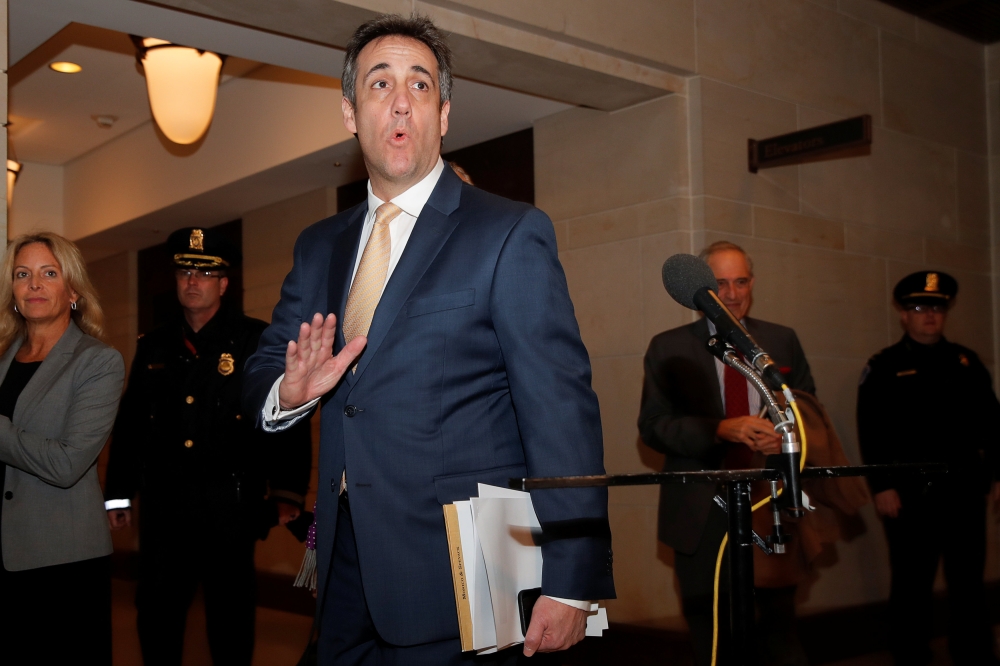 Michael Cohen, the former personal attorney of U.S. President Donald Trump, speaks to reporters after testifying before a closed House Intelligence Committee hearing on Capitol Hill in Washington, in this Feb. 28, 2019 file photo. — Reuters