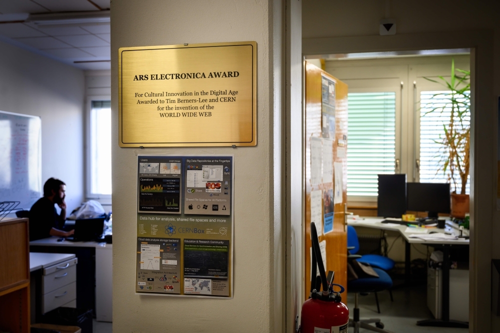 A plaque is displayed next to the former office of the inventor of the World Wide Web Tim Berners-Lee (on the right) at the European Organisation for Nuclear Research (CERN) in Meyrin, near Geneva. — AFP