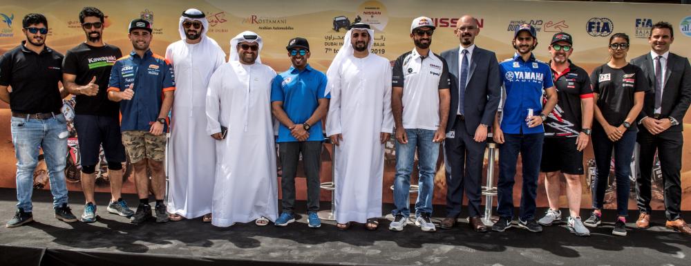 Mahir Badri, General Manager of the ATCUAE with sponsors of the 2019 Dubai International Baja.