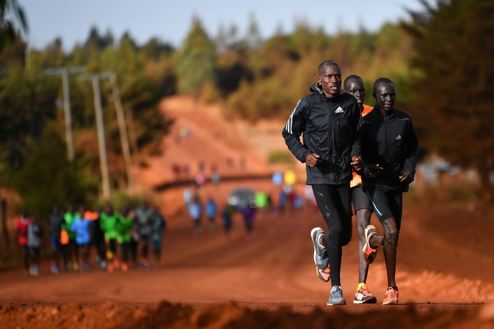 Athletes train along a dirt road under construction at Iten town, world-famous for its high-altitude training, producing international track and marathon champions.  Kenya hosts the world junior athletics championships in just over a year but unfortunately, Kenya is far from ready. — AFP