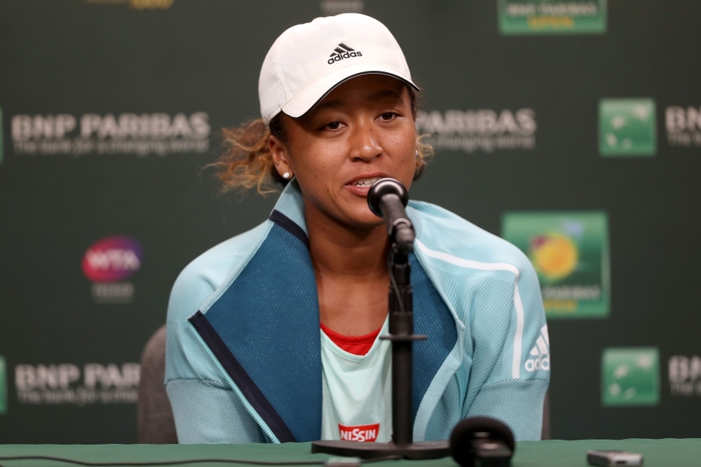 Naomi Osaka of Japan fields questions from the media at a press conference during the BNP Paribas Open at the Indian Wells Tennis Garden on Thursday in Indian Wells, California. — AFP