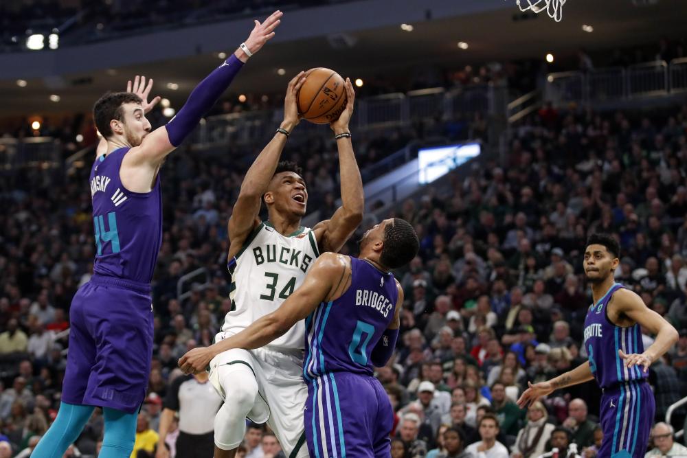 Milwaukee Bucks’ forward Giannis Antetokounmpo shoots against Charlotte Hornets’ forward Miles Bridges during their NBA game at Wisconsin Entertainment and Sports Center in Milwaukee Saturday. — Reuters