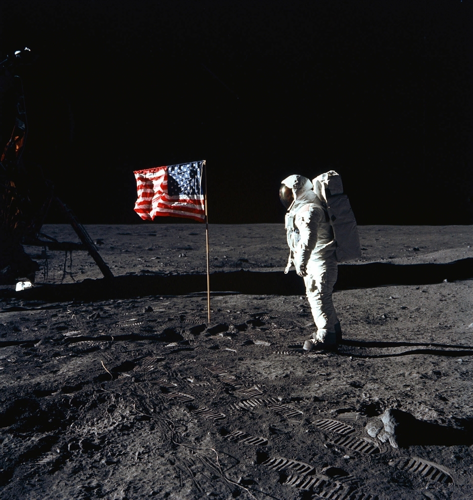 In this file photo taken on July 20, 1969, astronaut Edwin E. Aldrin, Jr., lunar module pilot of the first lunar landing mission, poses for a photograph beside the deployed US flag during Apollo 11 Extravehicular Activity (EVA) on the lunar surface area called the Sea of Tranquility.  — AFP