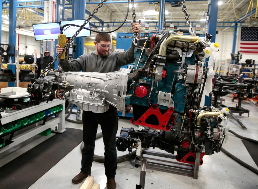 Mahindra Automotive North America President and CEO Rick Haas poses next to Roxor off-road vehicles in the MANA assembly plant in Auburn Hills, Michigan, US. — Reuters