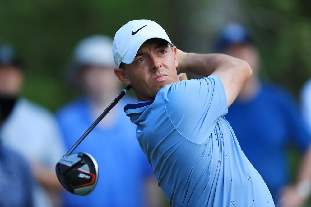 Rory McIlroy of Northern Ireland plays his shot from the 15th tee during the second round of The Players Championship at TPC Sawgrass in Ponte Vedra Beach, Florida, Friday. — AFP 