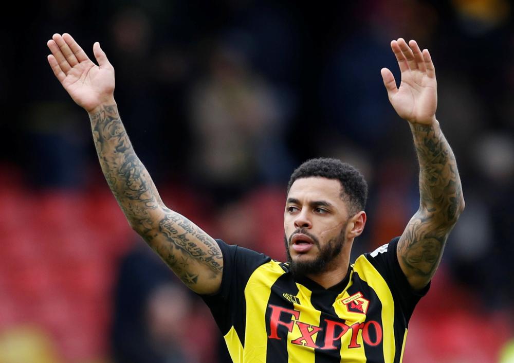 Watford's Andre Gray celebrates at the end of the FA Cup quarterfinal match against Crystal Palace at Vicarage Road, Watford, Saturday. — Reuters