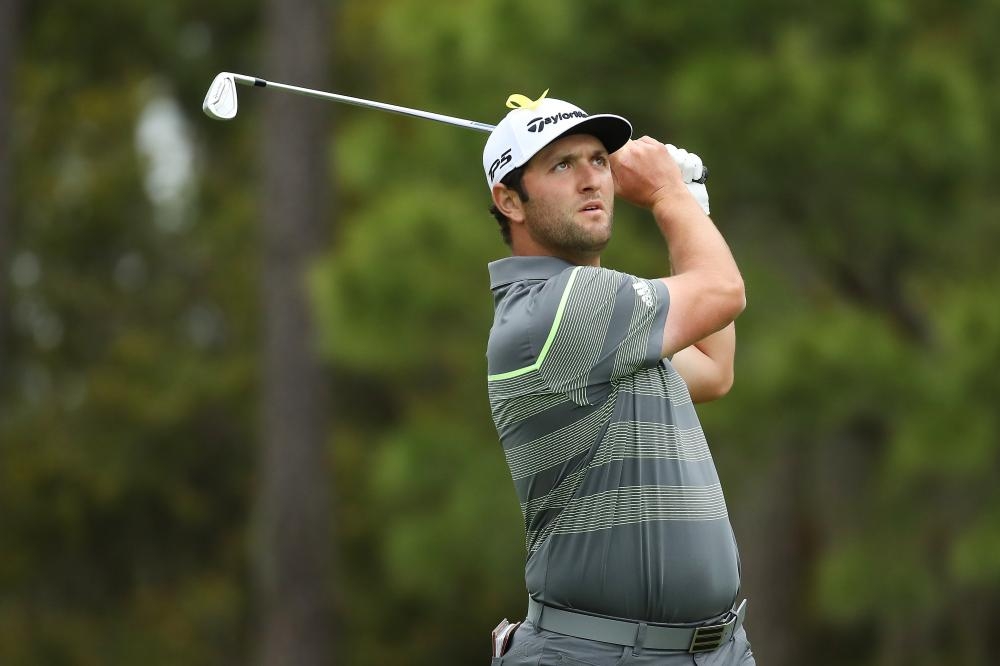 Jon Rahm of Spain plays a shot during the third round of The Players Championship at TPC Sawgrass in Ponte Vedra Beach, Florida, Saturday. — AFP 