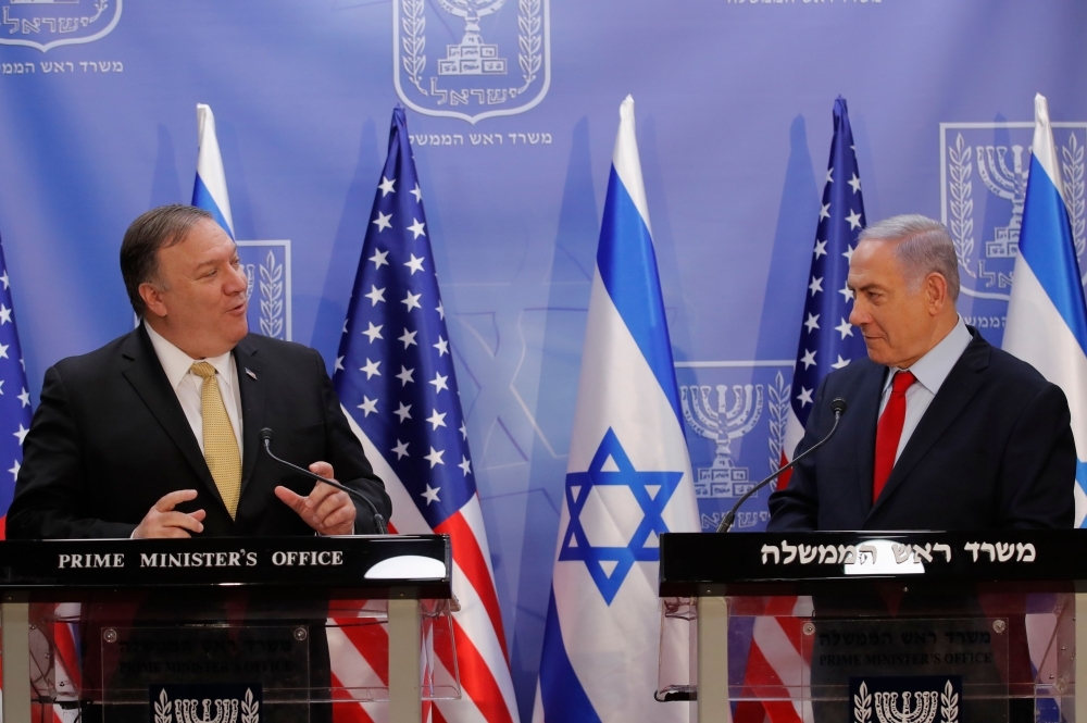 US Secretary of State Mike Pompeo, left, and Israeli Prime Minister Benjamin Netanyahu deliver a joint statement during their meeting in Jerusalem on Wednesday. — AFP