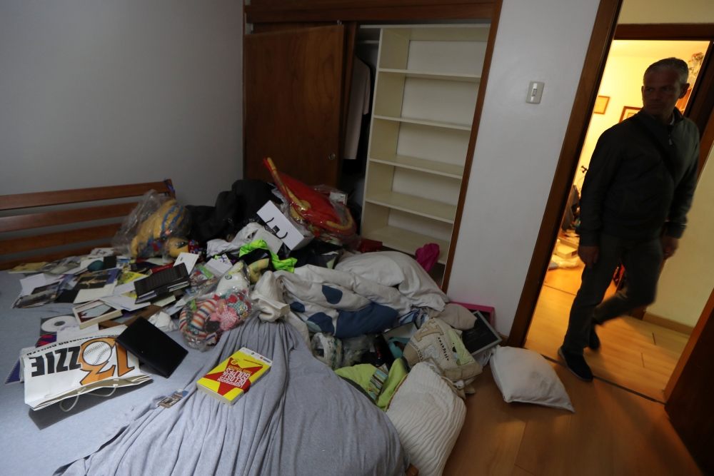 Personal belongings are seen on the floor at the residence of Roberto Marrero, chief of staff to opposition leader Juan Guaido, after he was detained by Venezuelan intelligence agents, according to legislators, in Caracas, Venezuela, on Thursday. — Reuters