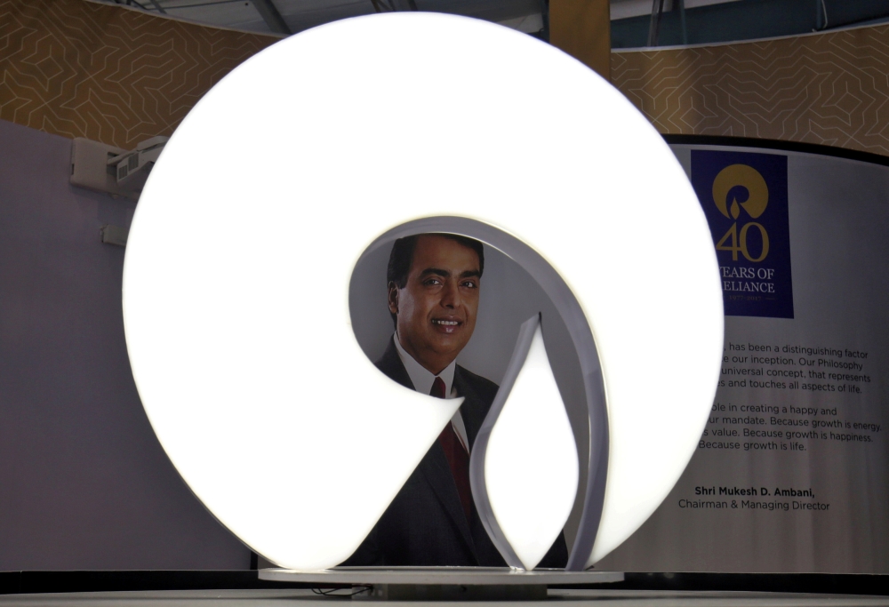 The logo of Reliance Industries is pictured in a stall at the Vibrant Gujarat Global Trade Show at Gandhinagar, India, in this file photo. — Reuters