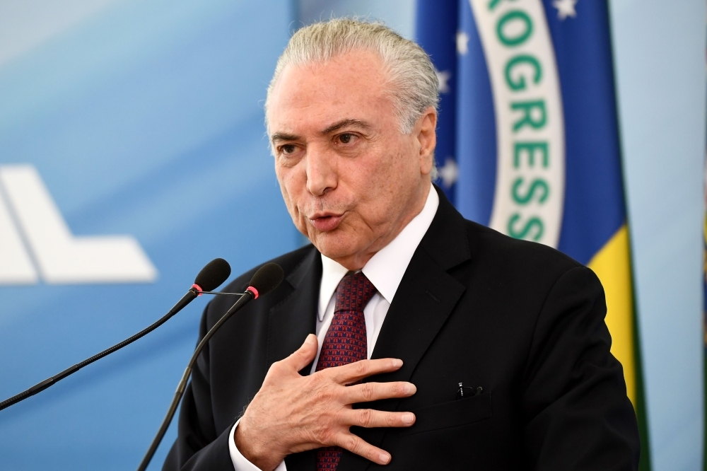 Brazilian President Michel Temer delivers a statement to defend himself and his family from allegations of corruption at Planalto Palace in Brasilia in this April 27, 2018 file photo. — AFP