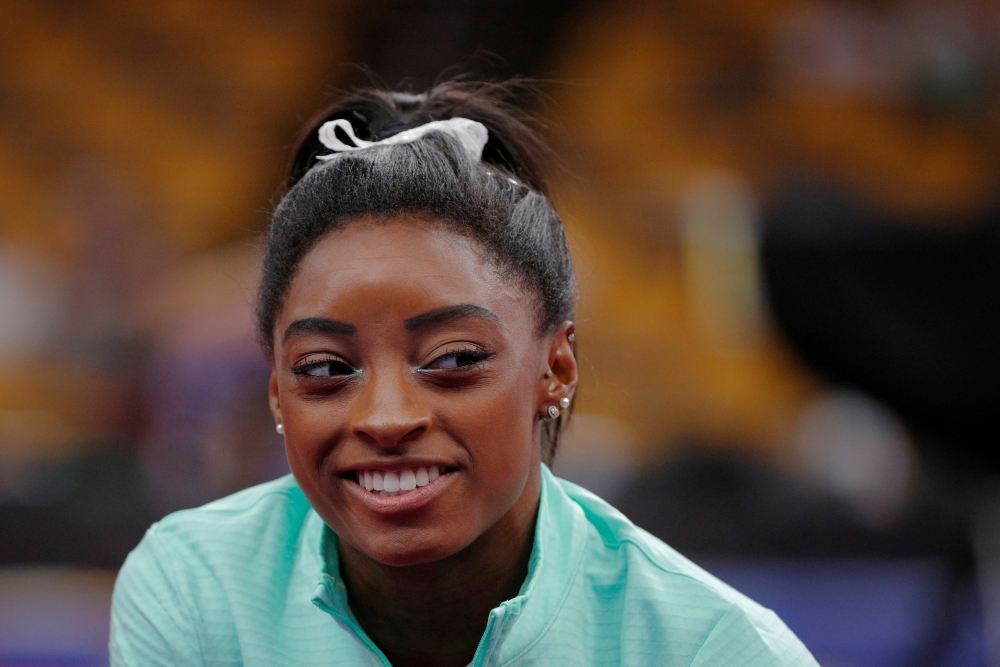 Simone Biles smiles during warm-ups at the US Gymnastics Championships in Boston, Massachusetts, US, in this file photo. — Reuters