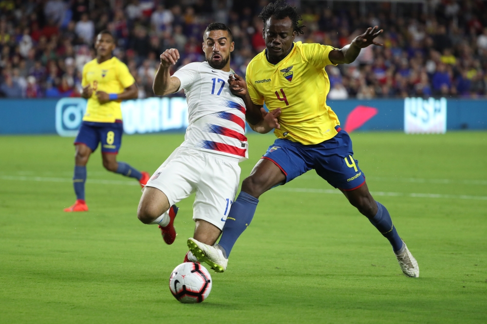 United States midfielder Sebastian Lletget (17) and Ecuador defender Juan Carlos Paredes (4) fight to control the ball during second half of an international friendly soccer match at Orlando City Stadium. — Reuters