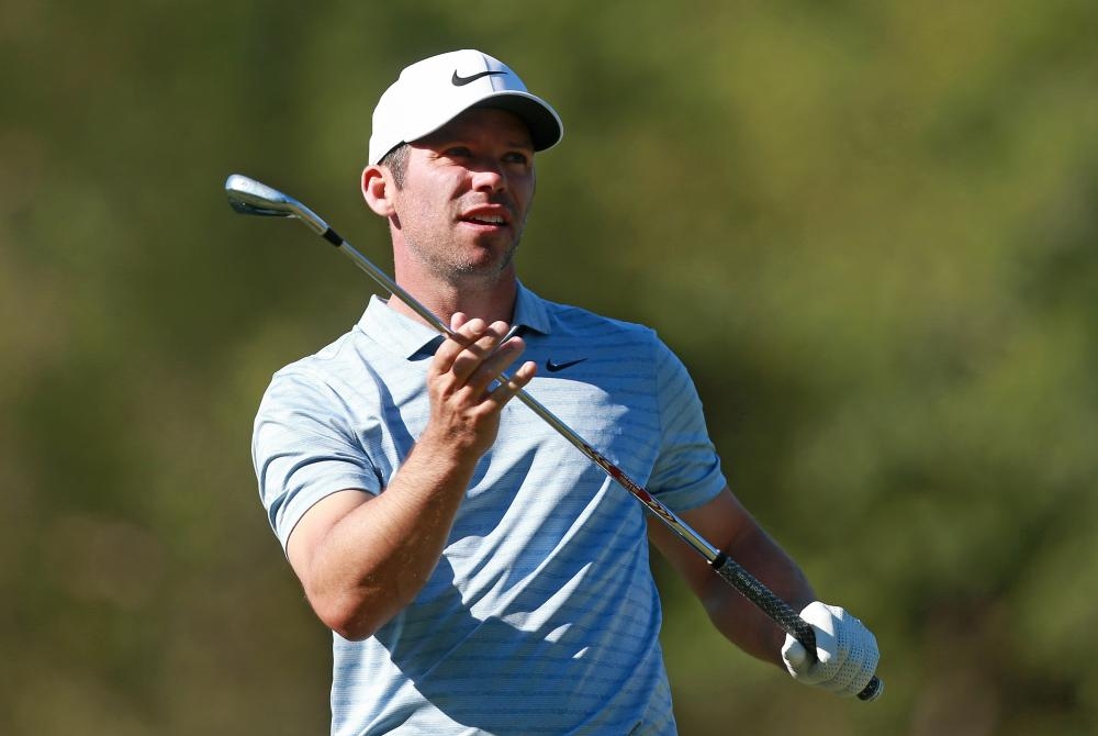 Paul Casey of England watches his tee shot on the 17th hole during the second round of the Valspar Championship at Innisbrook Golf Resort in Palm Harbor, Florida, Friday. — AFP 