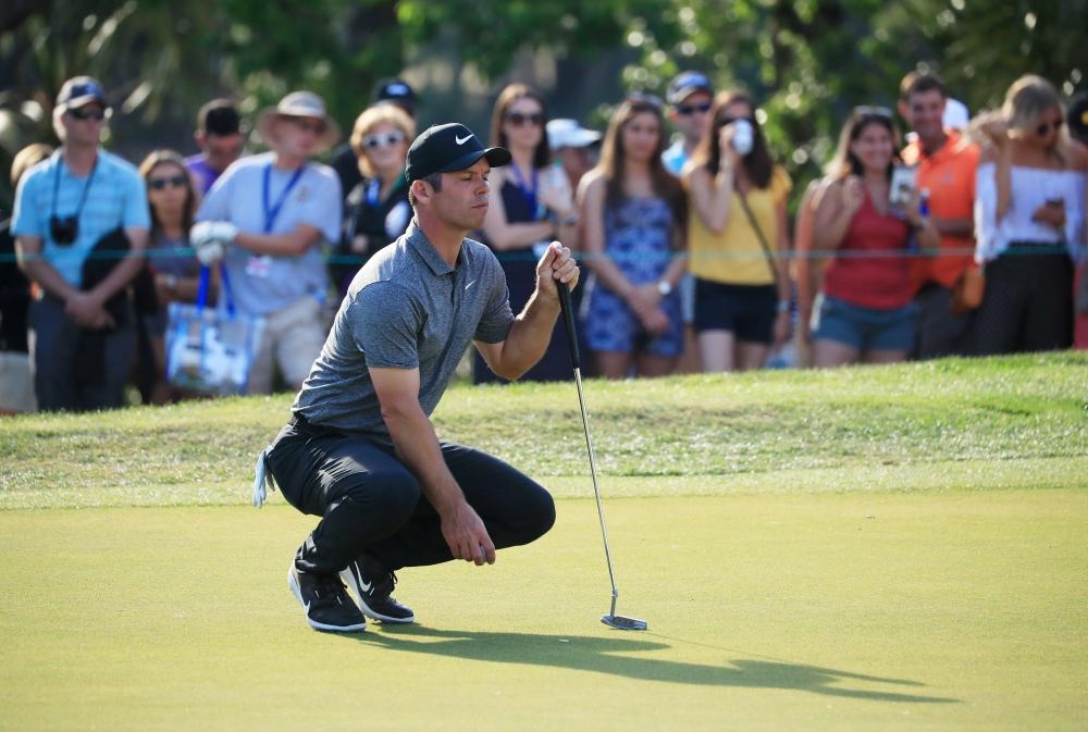 Paul Casey of England lines up a putt on the 17th green during the third round of the Valspar Championship at Innisbrook Golf Resort in Palm Harbor, Florida, Saturay. — AFP 