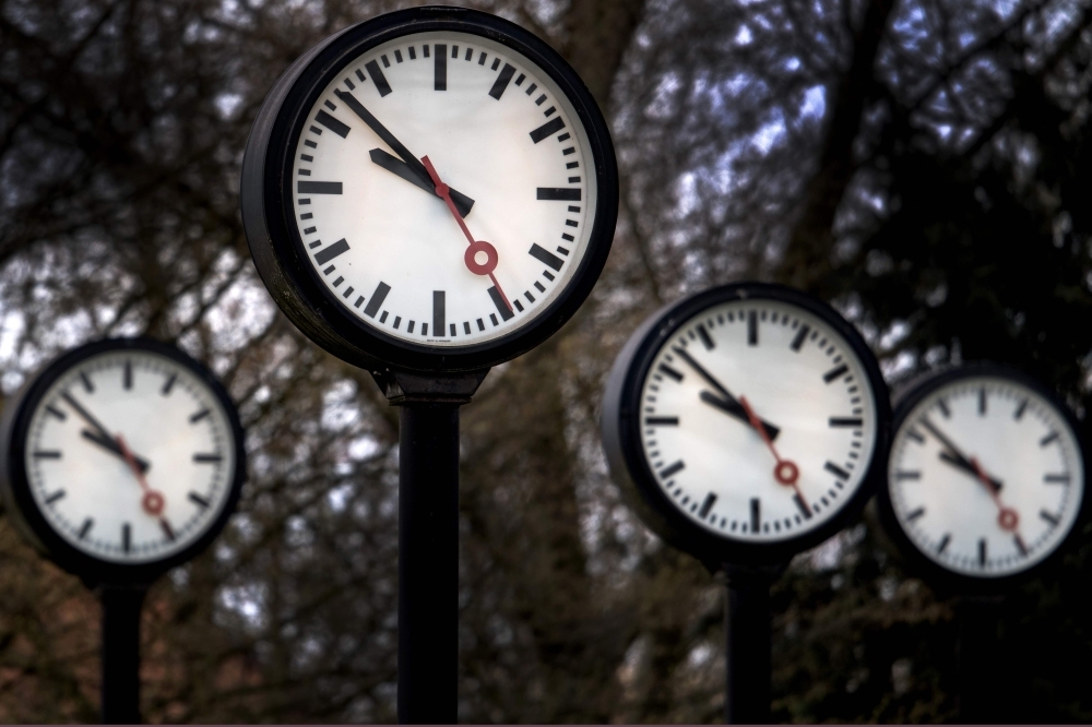 A picture taken on March 26, 2019 shows a detail of the “Zeitfeld” (Time field) sculpture by artist Klaus Rinke, which is made of 24 German railway clocks at a park entrance in Duesseldorf, western Germany. — AFP
