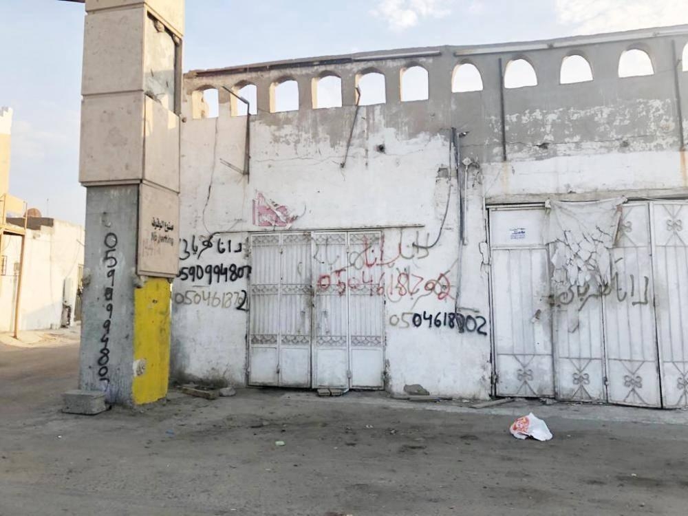 A structure marked for demolition in what was an industrial zone in Al-Nuzha district, which lies directly opposite Jeddah's new international airport.