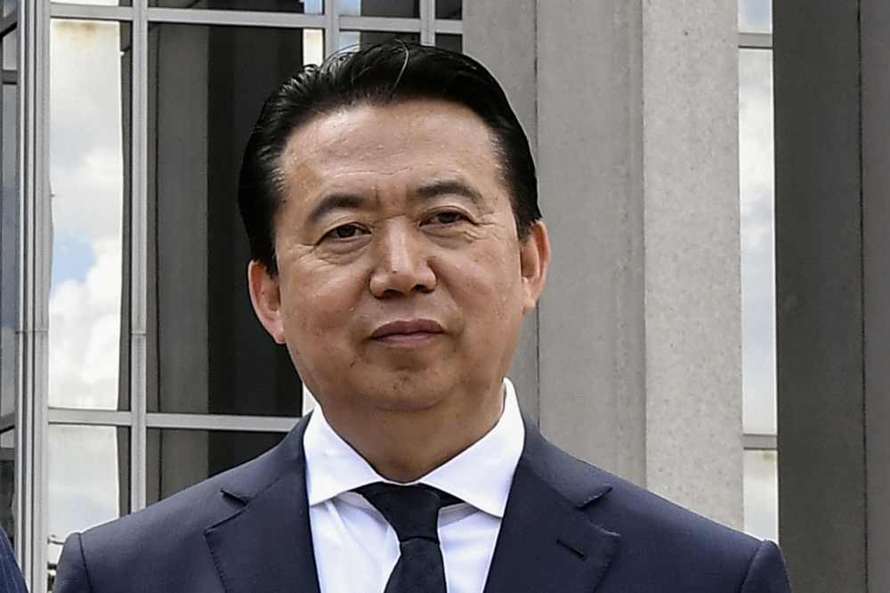 Meng Hongwei poses during a visit to the headquarters of International Police Organization in Lyon, France, in this May 8, 2018 file photo. — Reuters