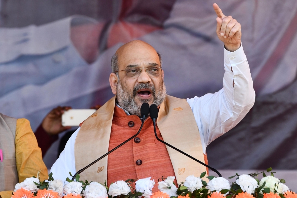 Bharatiya Janata Party (BJP) President Amit Shah gestures as he gives a speech during an election rally at Kaliabor, some 186 km from Guwahati, the capital city of India’s northeastern state of Assam on Thursday. — AFP