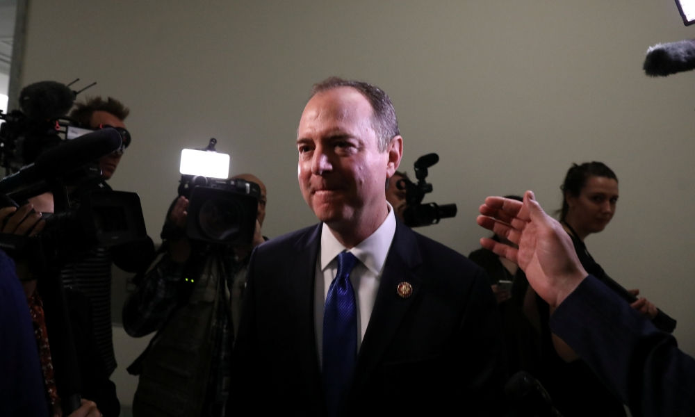 House Intelligence Committee Chairman Adam Schiff (D-CA) talks to reporters during a break in a House Intelligence Committee hearing titled 