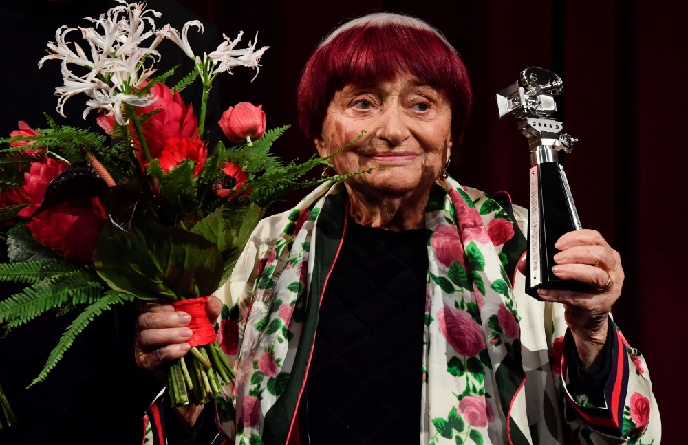 French director Agnes Varda reacts on stage as she is awarded with the Berlinale Camera award at the 69th Berlinale film festival in Berlin in this Feb. 13, 2019 file photo. — AFP