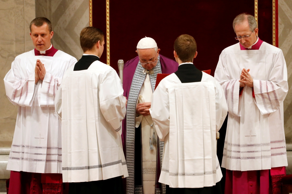 Pope Francis leads the penitential liturgy at the Vatican on Friday. — Reuters