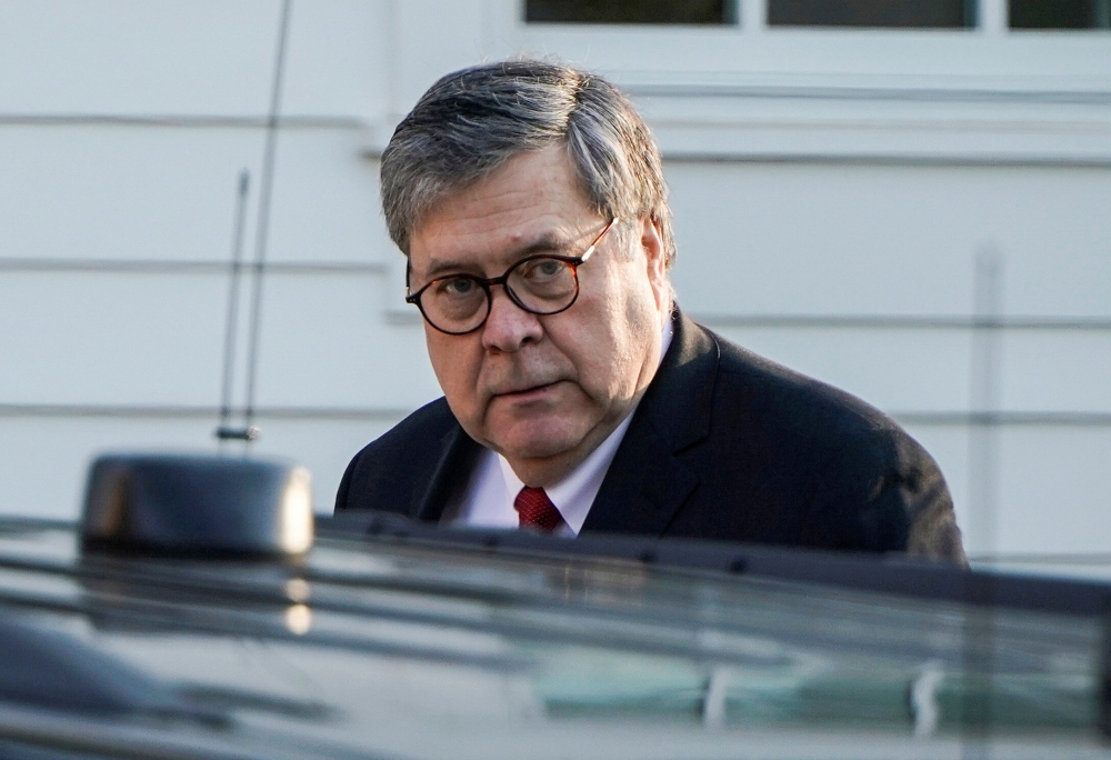 US Attorney General William Barr leaves his house in this recent photo. — Reuters