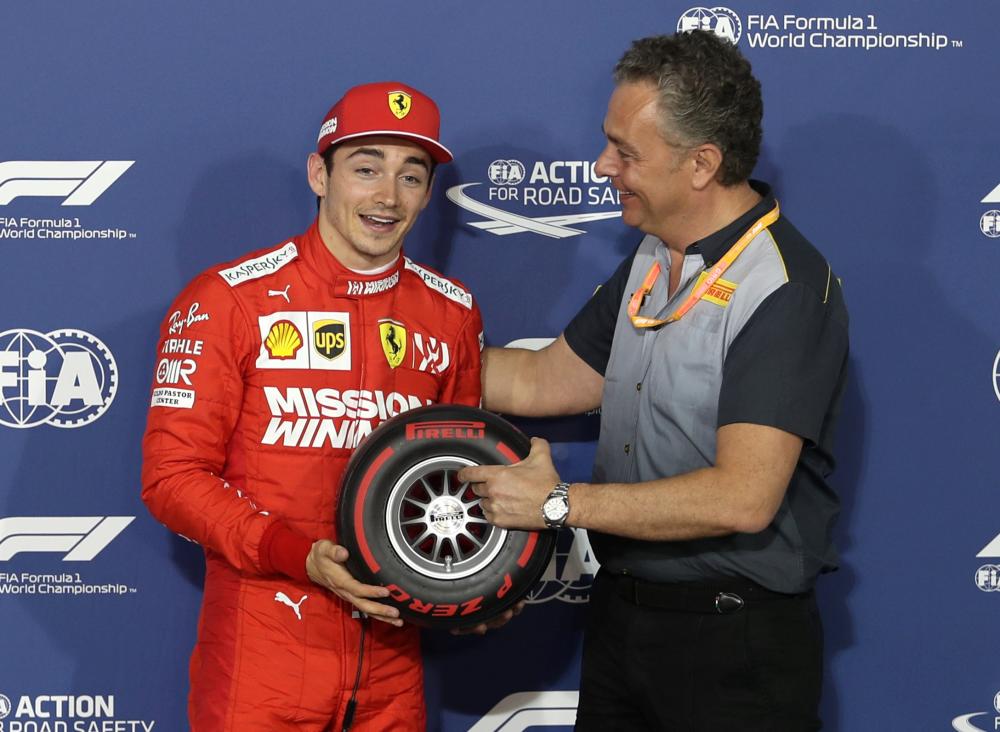 Ferrari's Charles Leclerc celebrates after qualifying in pole position at Bahrain Grand Prix Saturday. — Reuters