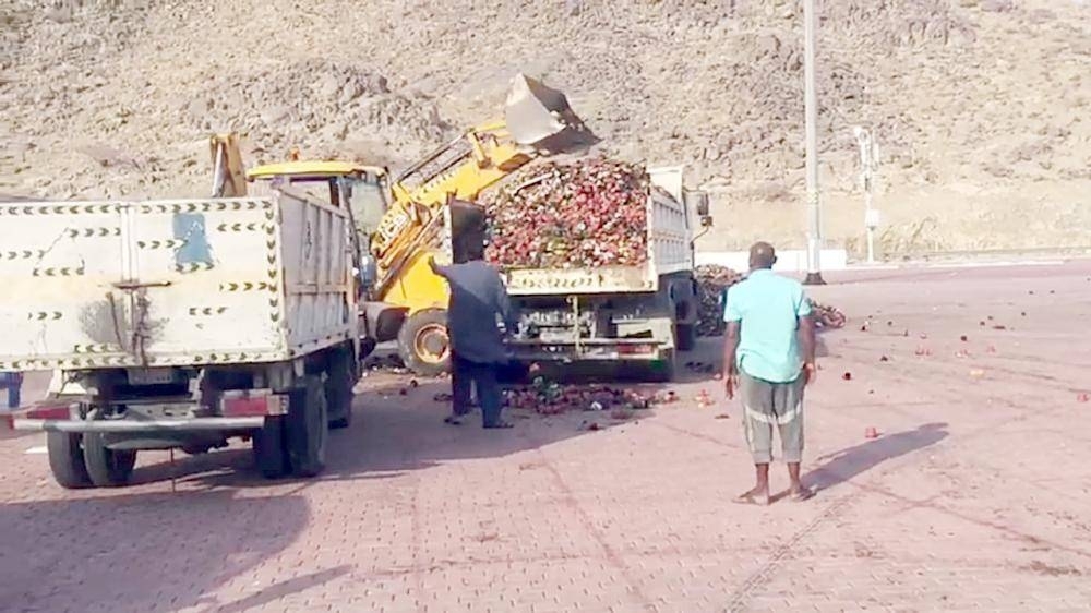 


Municipality trucks remove flowers from Muzdalifah following the Makkah flower festival.