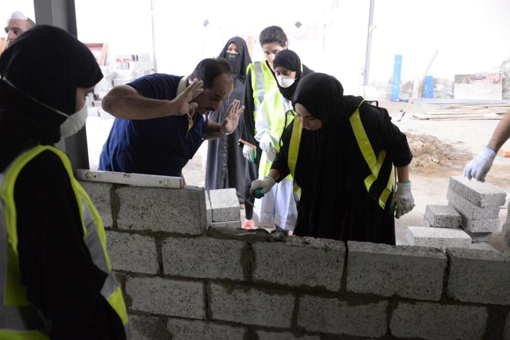 Saudi female engineers getting hands-on field training. — Okaz photo