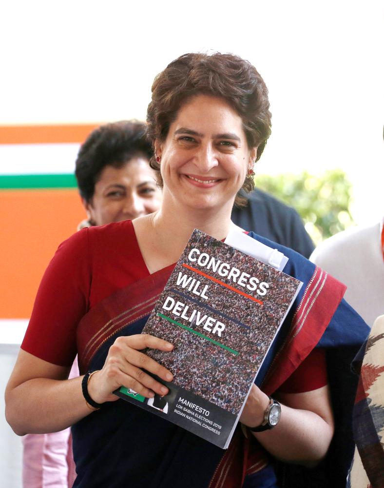 


Priyanka Gandhi Vadra, a leader of India’s main opposition Congress party and sister of the party president Rahul Gandhi, holds her party’s election manifesto for the April/May general election in New Delhi, India, on Tuesday. — Reuters