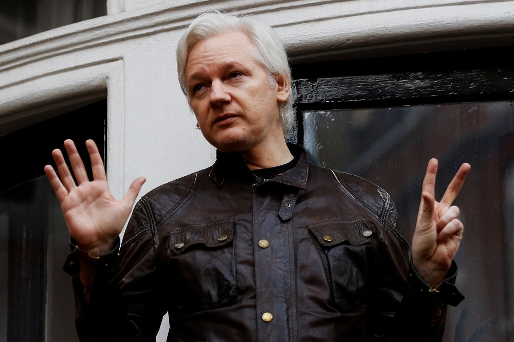 WikiLeaks founder Julian Assange is seen on the balcony of the Ecuadorian Embassy in London in this May 19, 2017 file photo. — Reuters