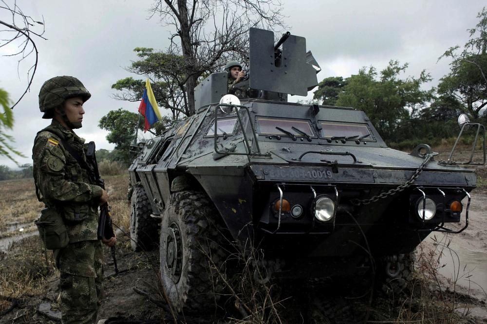 Colombian soldiers stand guard during a military operation at the border with Venezuela in Cucuta, Colombia, in this Feb. 13, 2018 file photo. — Reuters 