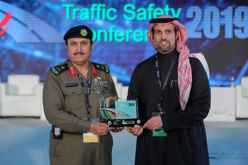 General Manager of the General Directorate of Traffic Major General  Mohammed Al Bassami  honors Almajdouie Motors Company and grants honorary shield received by Mohammed Almajdouie, CEO of  Almajdouie Motors - Changan,