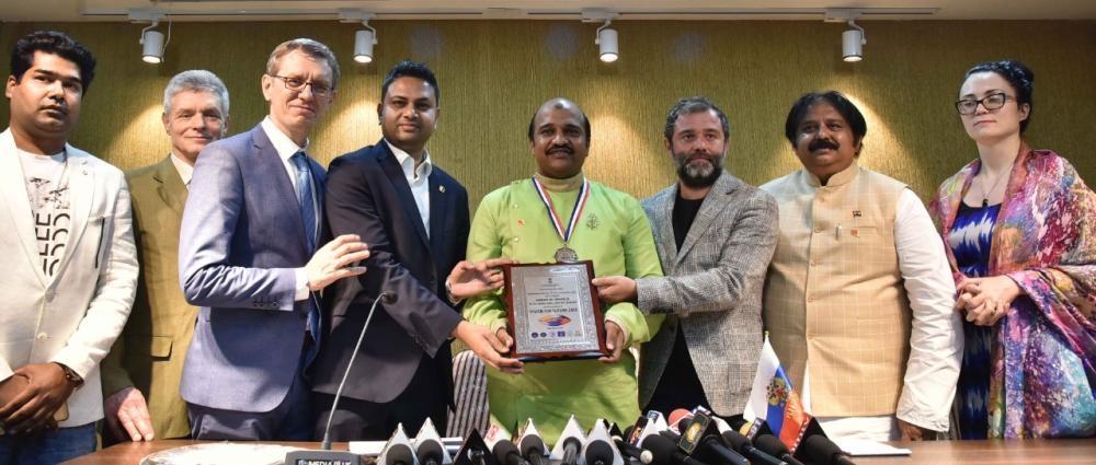 Jaber Patel, center, president of Indo Arab Friendship Forum, receives the BRICS Award at Media Plus Auditorium in Hyderabad, India, last week. — Courtesy photo