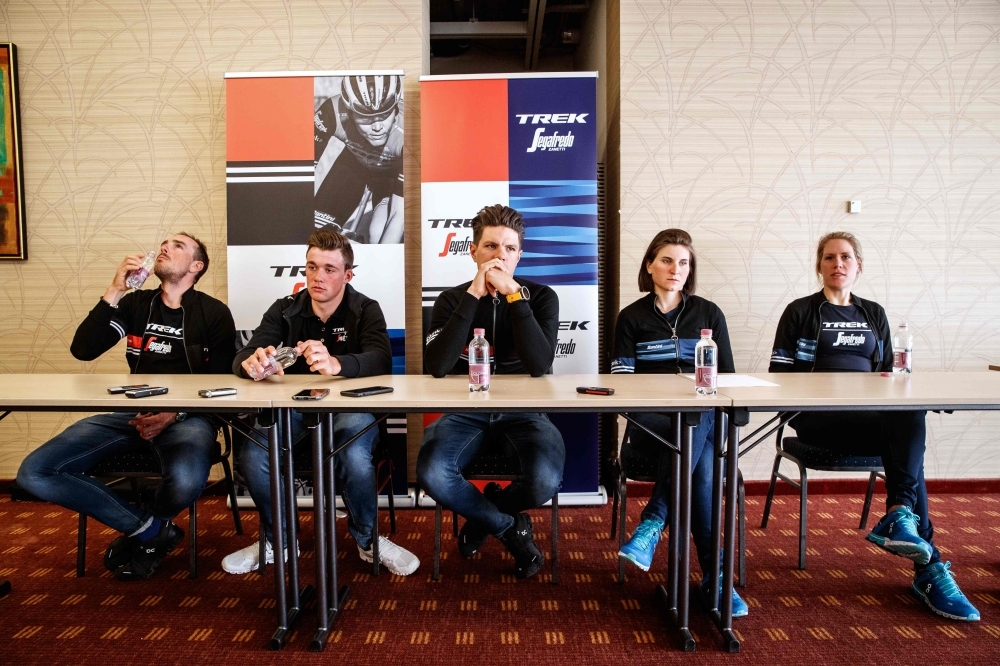 (From L) Trek-Segafredo riders, Germany's John Degenkolb, Denmark's Mads Pedersen, Belgium's Jasper Stuyven, Italy's Elisa Longo Borghini and Netherlands' Ellen Van Dijkgive a press conference in Sint-Michiels on Thursday ahead of the 'Ronde van Vlaanderen — Tour des Flandres — Tour of Flanders' one day cycling race. — AFP