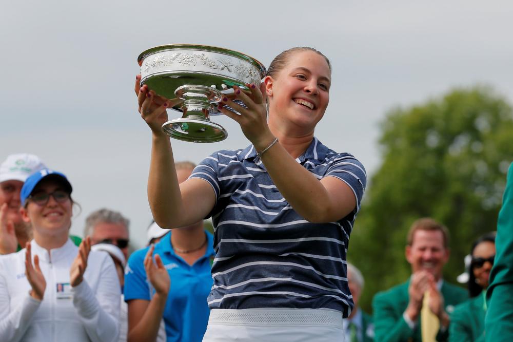 Jennifer Kupcho celebrates with the trophy after winning the inaugural National Women’s Amateur championship at Augusta National Golf Club in Augusta Saturday. — Reuters