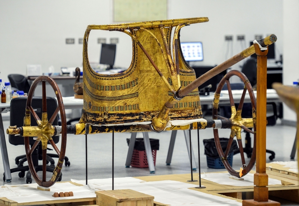 


A view of the gilded chariot of the Tutankhamun collection currently undergoing work at the restoration lab of the newly-built Grand Egyptian Museum (GEM) in Giza on the southwestern outskirts of the capital Cairo.  — AFP photos